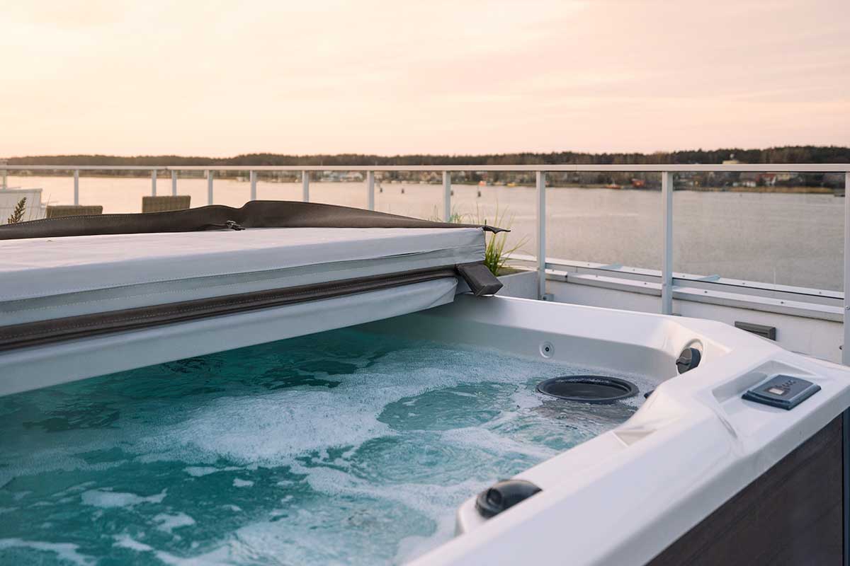 Hot Tub with top cover on it - empire pool and patio